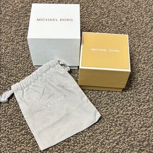 Bundle of Michael Kors watch boxes and pouch